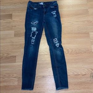 ripped dark wash jeans